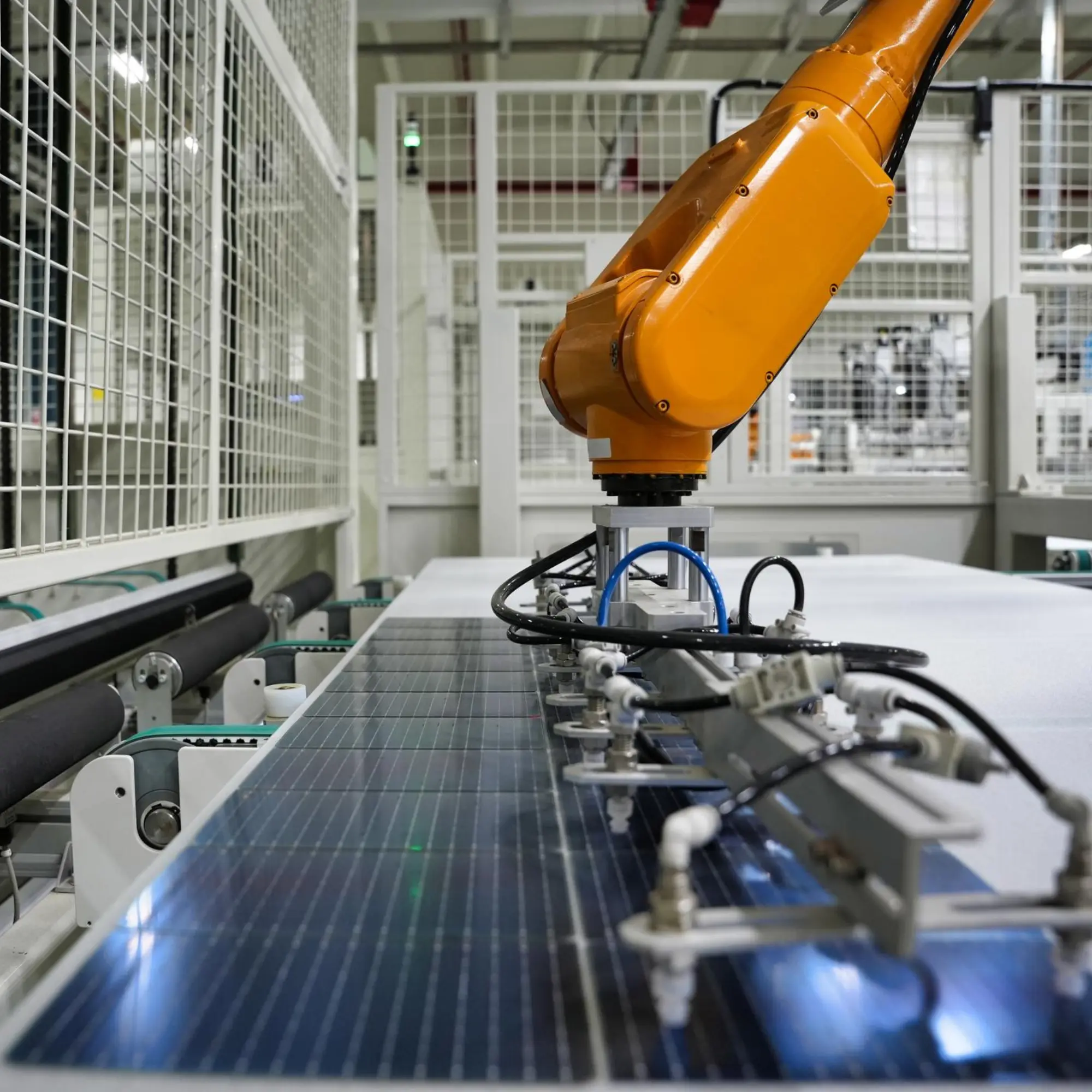 Automated solar module manufacturing line