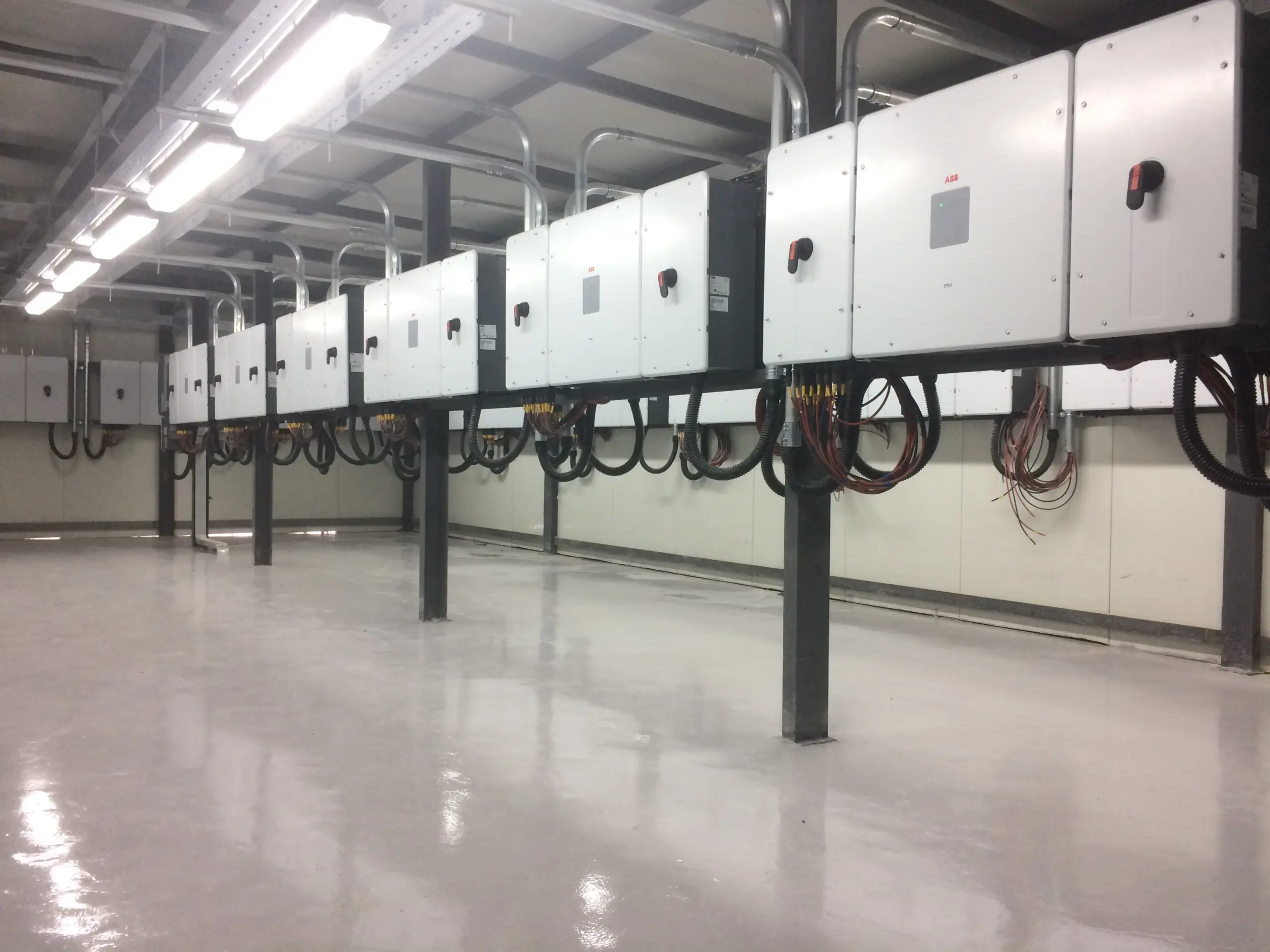 ABB Trio inverter room and power conversion equipment at Al Emlaq solar project
