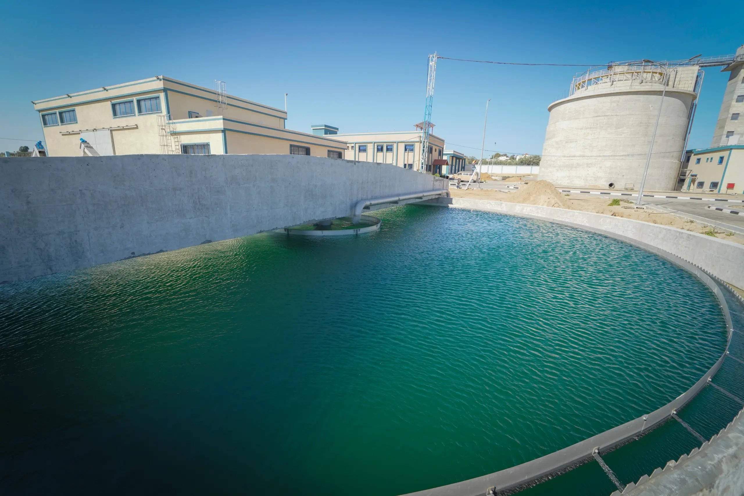 Water treatment basin and facility buildings at Gaza Central treatment plant