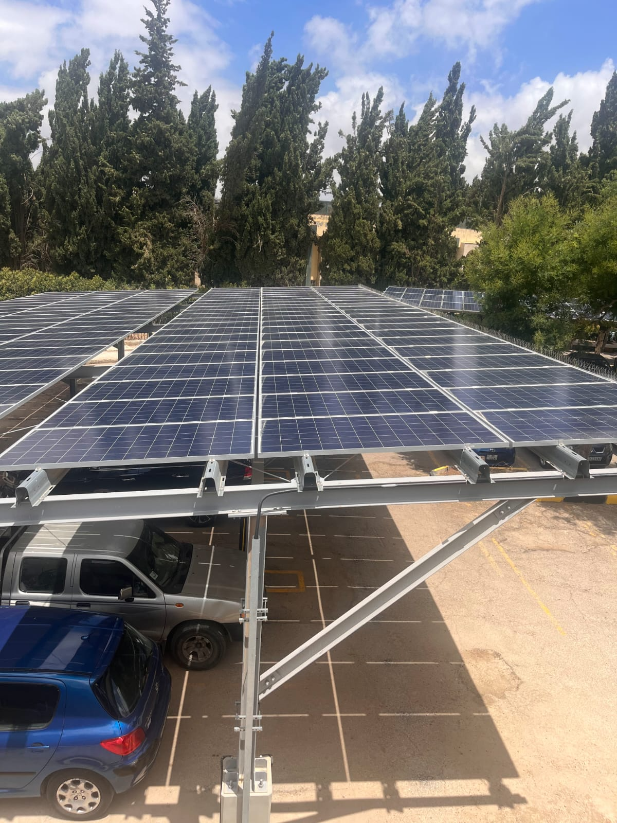 Close view of solar carpark steel structure and PV module rows