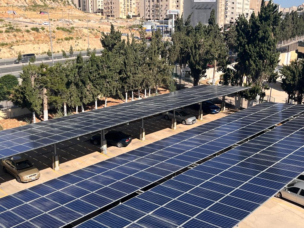 Solar carpark PV rows shading vehicles at University of Jordan