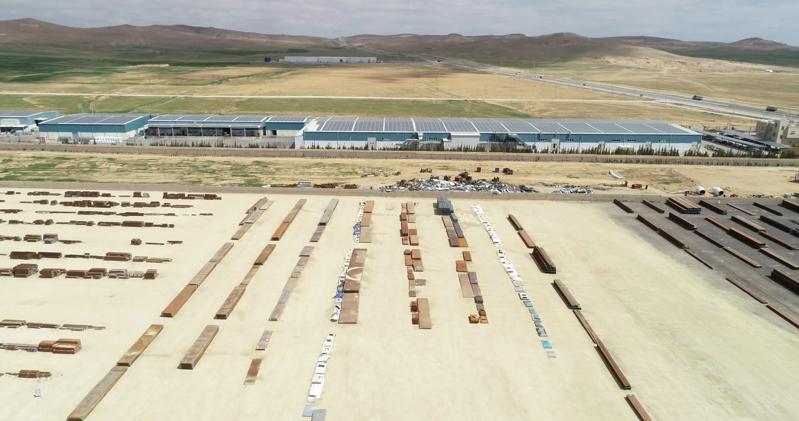 Wide industrial site view showing Giant Industrial Group rooftop PV plant