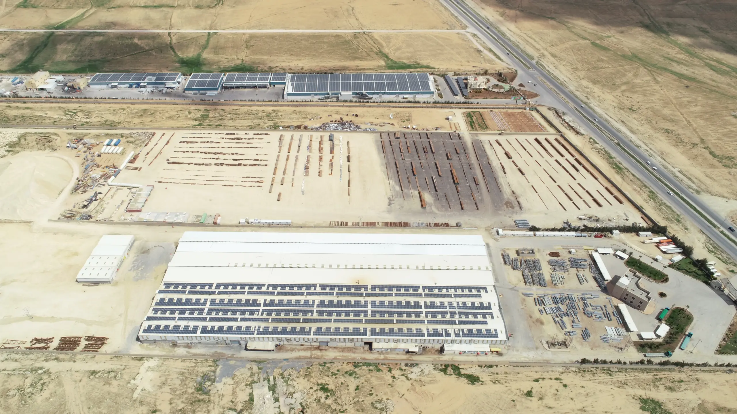 Aerial overview of Giant Industrial Group rooftop solar plant and facility